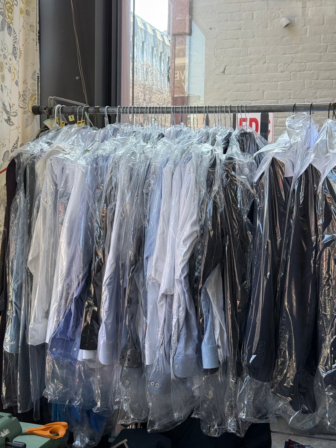 Freshly pressed garments in a local dry cleaner